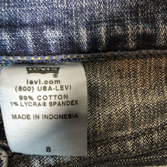 Levi's Women's Mini Denim Skirt with Dark Bule Flower Accent Size 8 - Picture 4 of 10